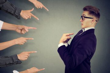 a man being pointed at