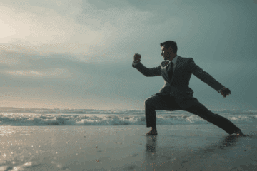 a business man doing martial arts.